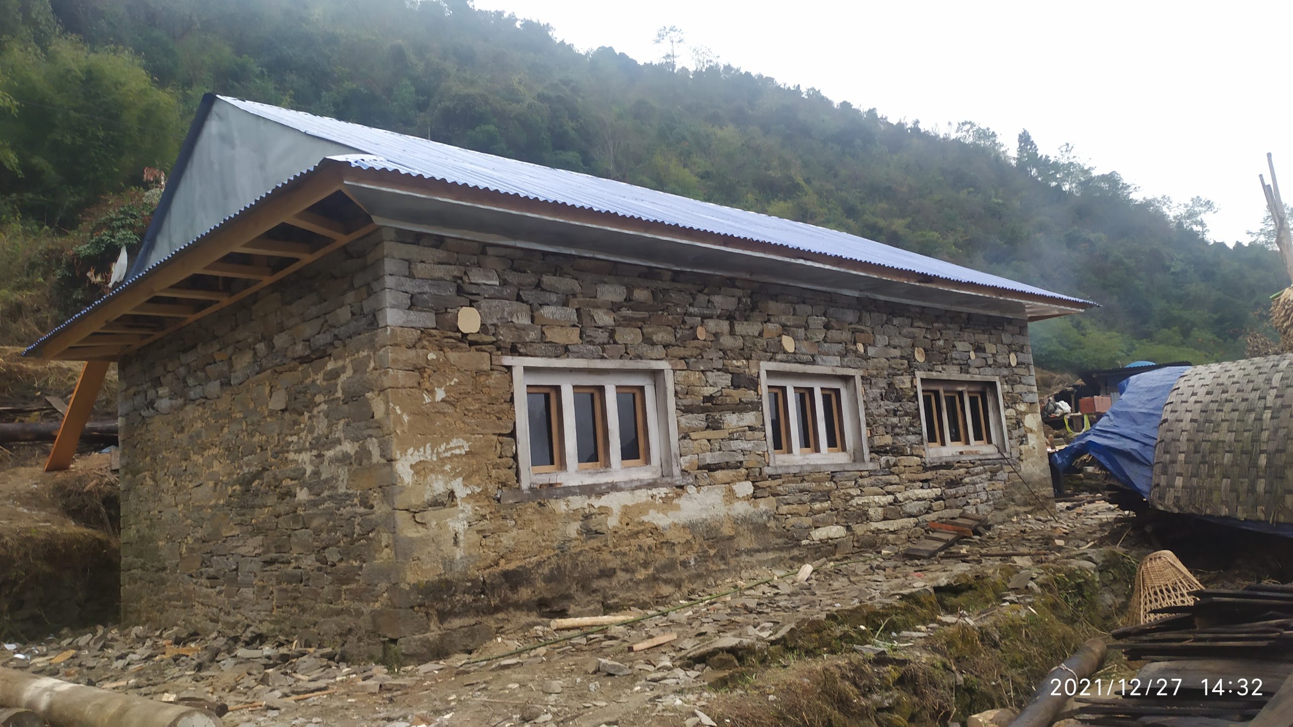 Glass windows support for poor family house
